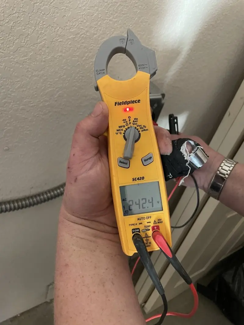 Voltage testing with clamp meter during Outlet Installation in Waynesburg